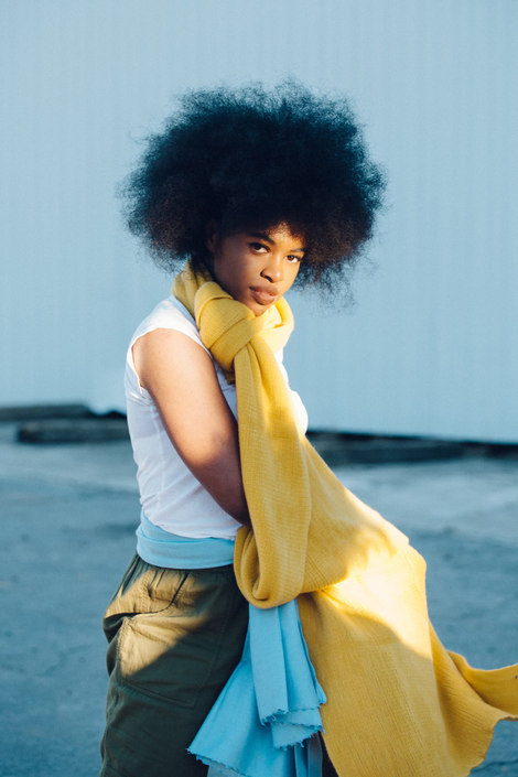 Shell as the main character from Dandara, cosplaying with her natural hair two years after her big chop.